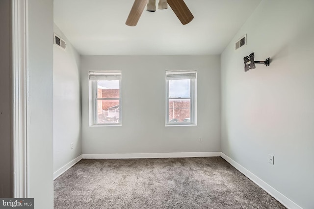 222 S Carey St, Baltimore, MD 21223 - unfurnished room with healthy amount of natural light, carpet, and ceiling fan