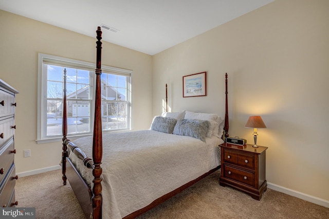 bedroom with light carpet