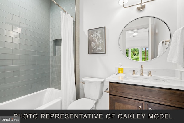 full bathroom featuring shower / bathtub combination with curtain, vanity, and toilet