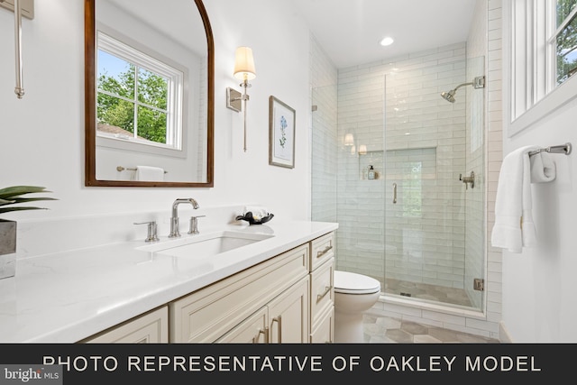 bathroom with toilet, tile patterned flooring, a shower with door, and vanity