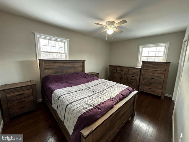 bedroom with ceiling fan and dark wood-type flooring