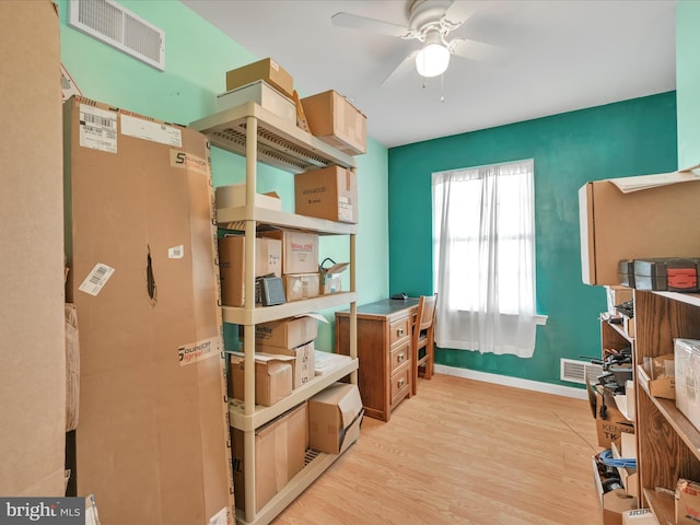 storage room with ceiling fan