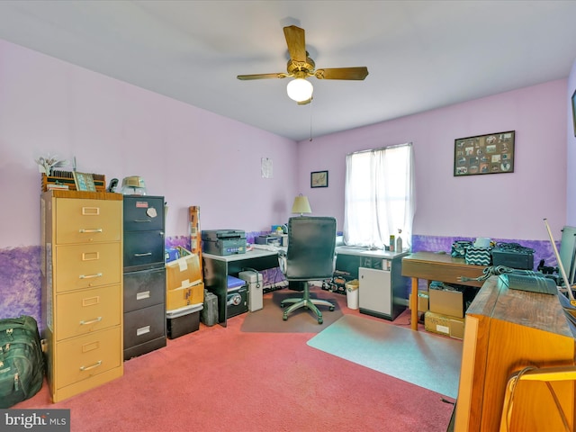 carpeted office with ceiling fan