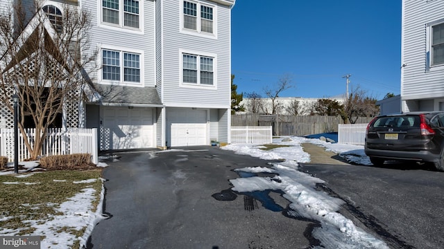 exterior space with a garage