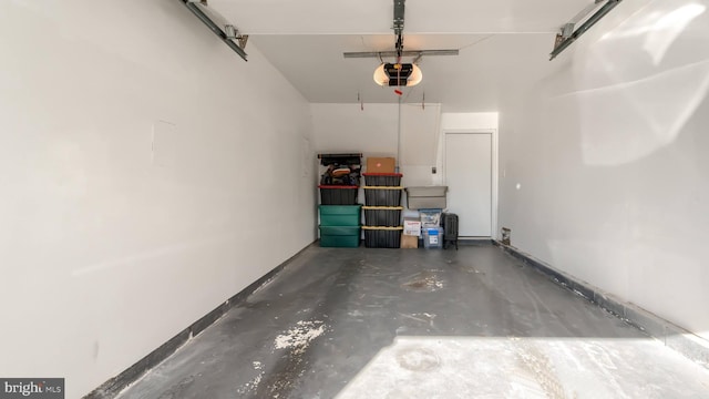 garage featuring a garage door opener