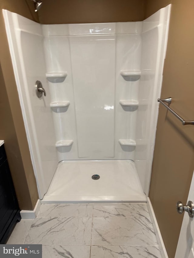 bathroom with walk in shower