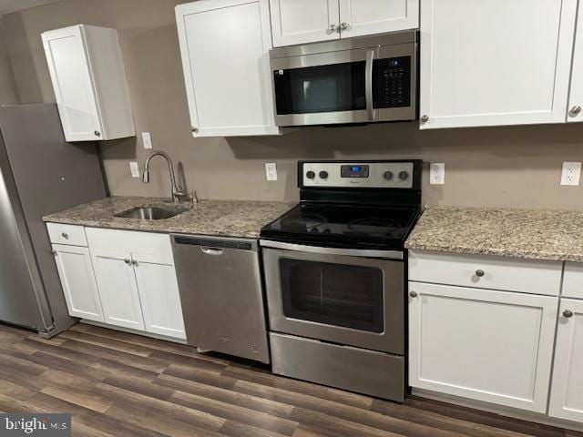 140 Jones Way, Browns Mills, NJ 08015 - kitchen featuring white cabinets, light stone countertops, sink, and appliances with stainless steel finishes
