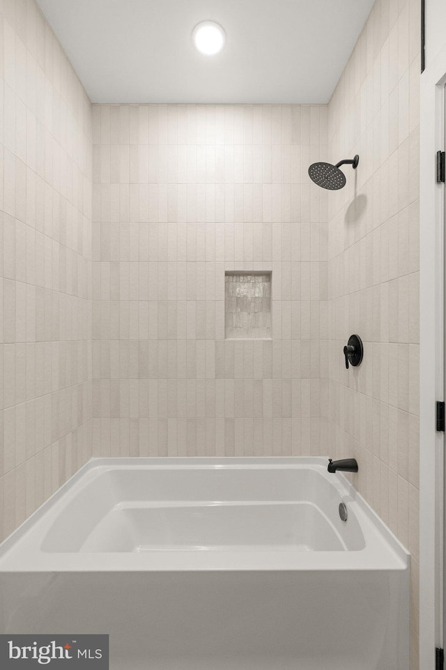 bathroom featuring shower / washtub combination