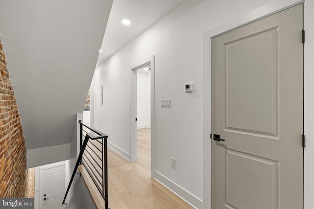 hallway featuring light hardwood / wood-style flooring