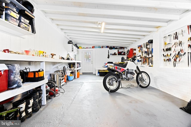 garage with a workshop area