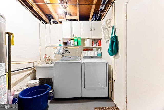 laundry area with washing machine and dryer