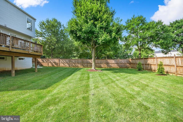 view of yard with a deck