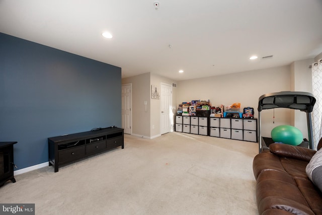 workout area with light colored carpet