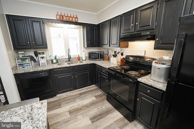 kitchen with light stone countertops, sink, light hardwood / wood-style floors, and black appliances