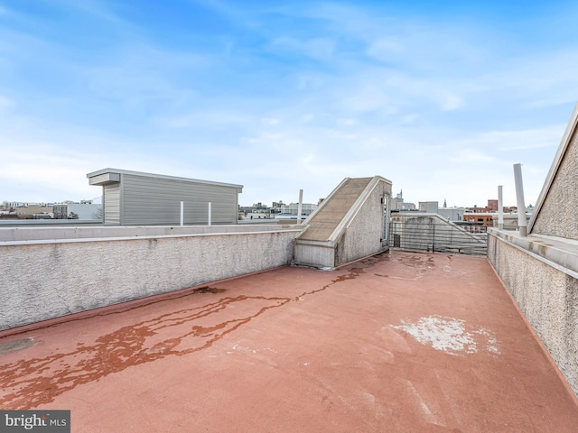 view of patio with a balcony