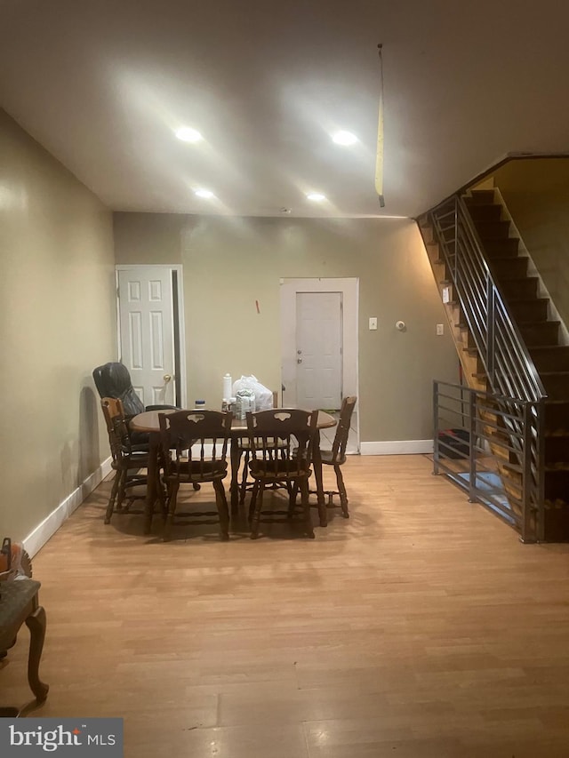 dining area featuring hardwood / wood-style flooring