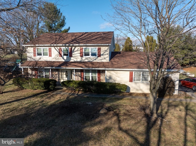 view of front of home with a front yard