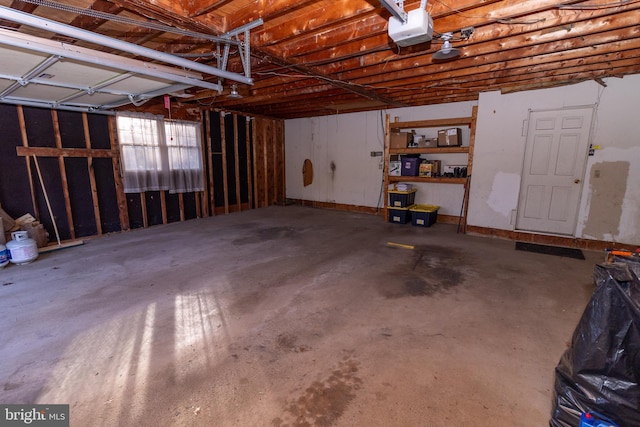 garage featuring a garage door opener