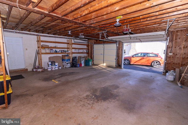 garage featuring a garage door opener