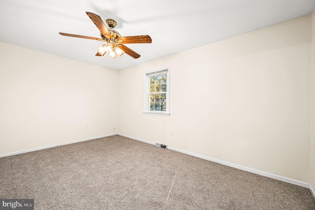 unfurnished room with carpet and ceiling fan