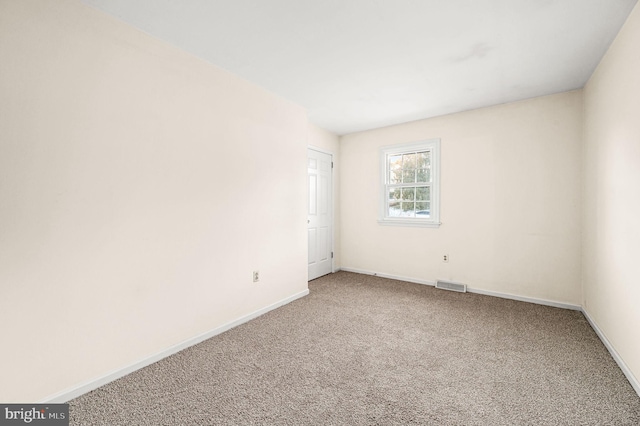 view of carpeted spare room