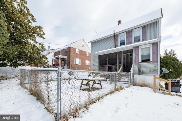 view of snow covered property