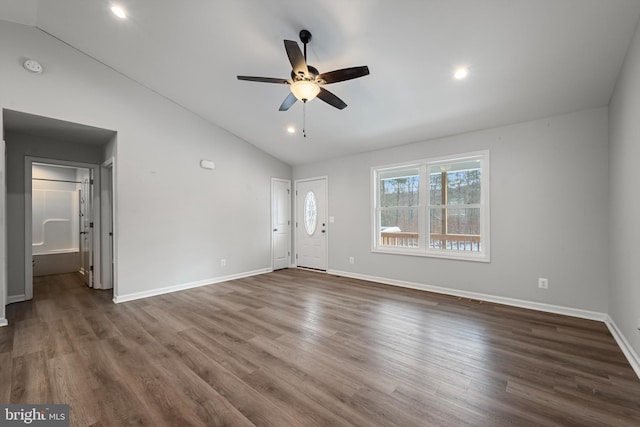 unfurnished living room featuring ceiling fan, hardwood / wood-style floors, and high vaulted ceiling