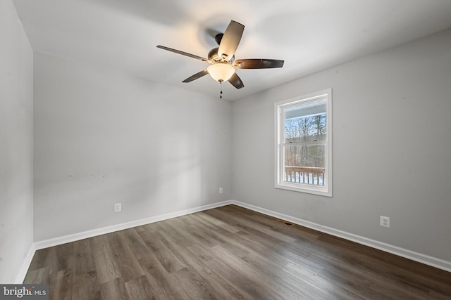 unfurnished room featuring hardwood / wood-style floors and ceiling fan