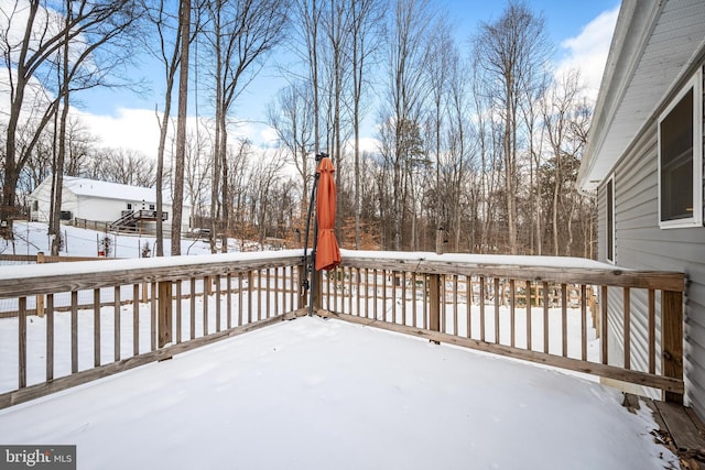 view of snow covered deck