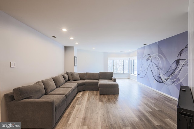 living room with light hardwood / wood-style flooring