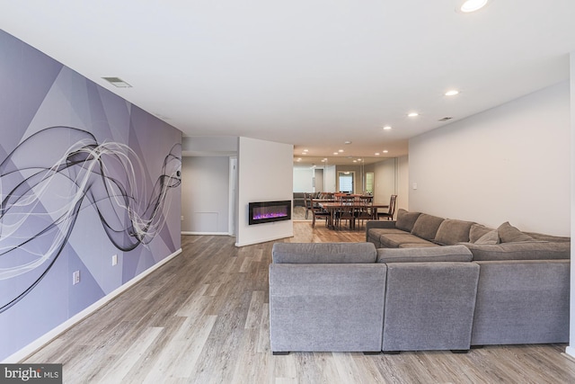 living room with wood-type flooring