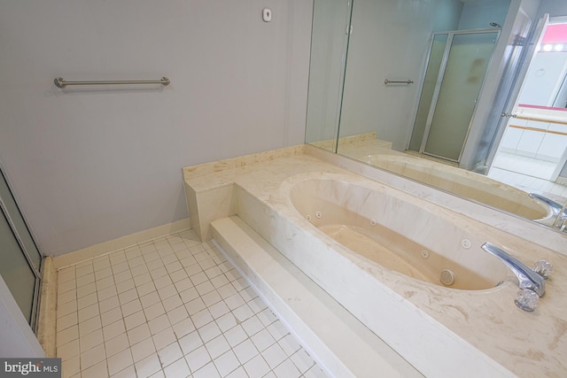 bathroom featuring tile patterned flooring and shower with separate bathtub