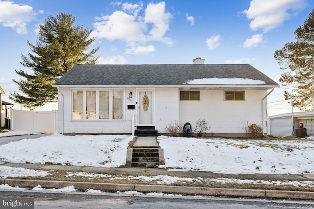 view of front of property with central AC unit