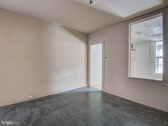 spare room featuring a wealth of natural light