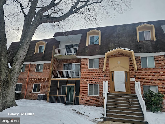 view of front of property with cooling unit