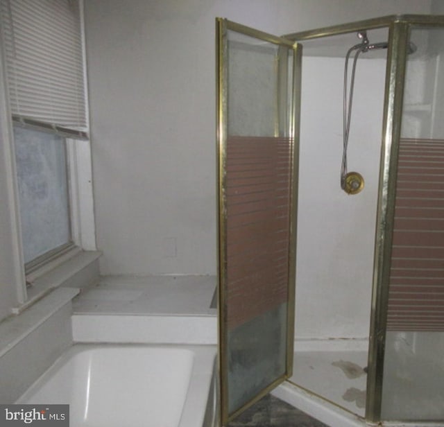 bathroom featuring walk in shower