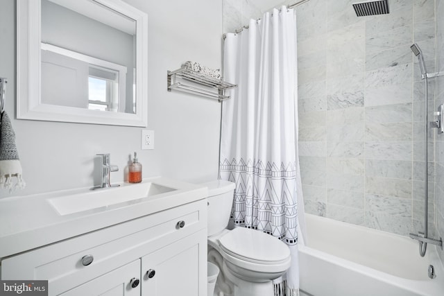 full bathroom featuring vanity, toilet, and shower / tub combo