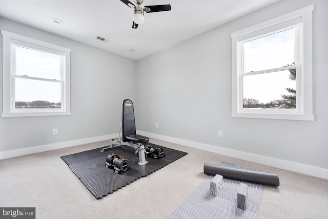 workout area with carpet flooring and ceiling fan