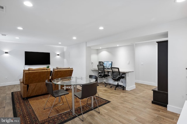 dining area featuring light hardwood / wood-style flooring