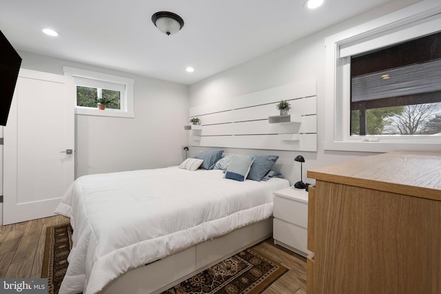 bedroom featuring dark wood-type flooring