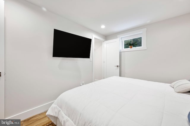 bedroom featuring hardwood / wood-style floors