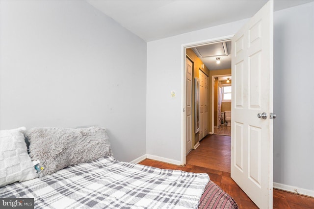 bedroom featuring dark hardwood / wood-style floors