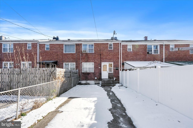 view of snow covered property