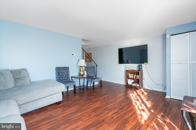 living room featuring dark hardwood / wood-style floors