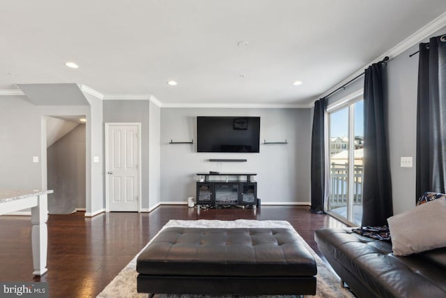 living room with crown molding and dark hardwood / wood-style flooring