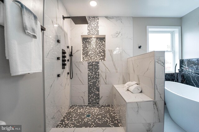 bathroom with independent shower and bath