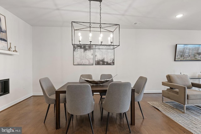 dining room with hardwood / wood-style floors