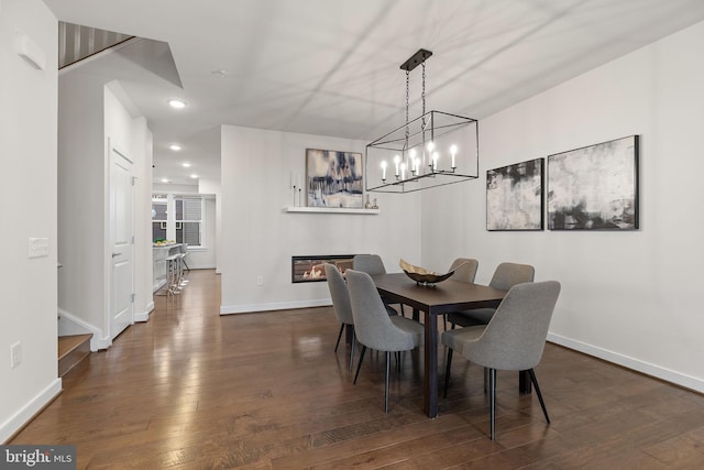 dining room with dark wood-type flooring