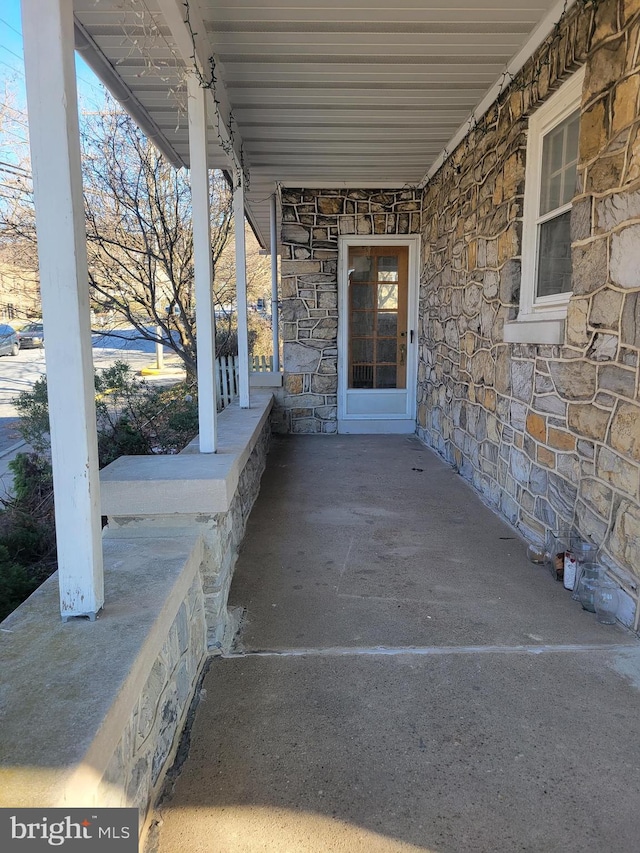 view of patio featuring a porch