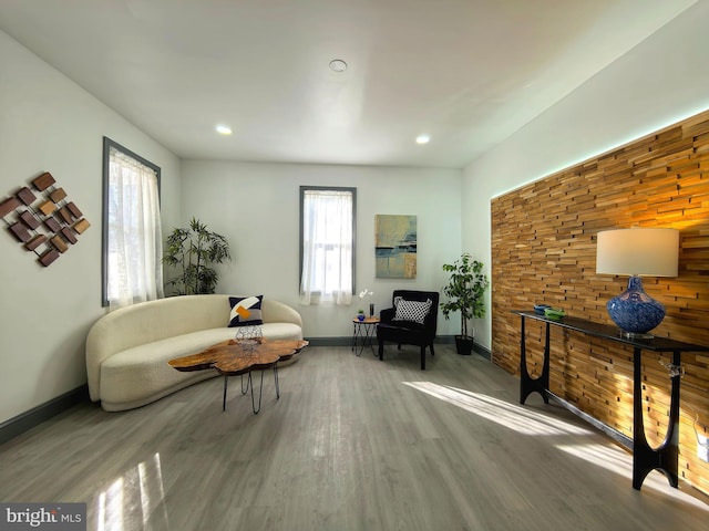 living area with hardwood / wood-style floors